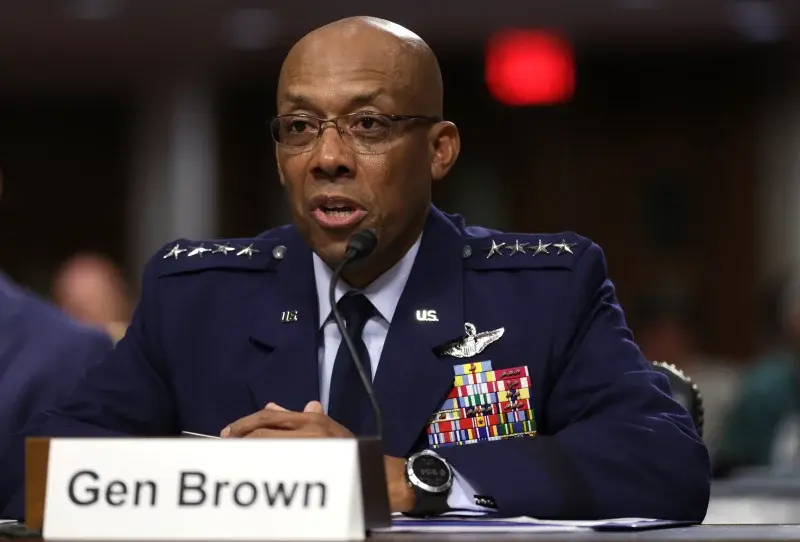 General Brown of the us air force fired by trump. Wearing blue air force suit and has many badges on his left side